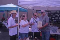 Presenting Plaque to Full Throttle Roadhouse and Randy and Liz for making this day possible.